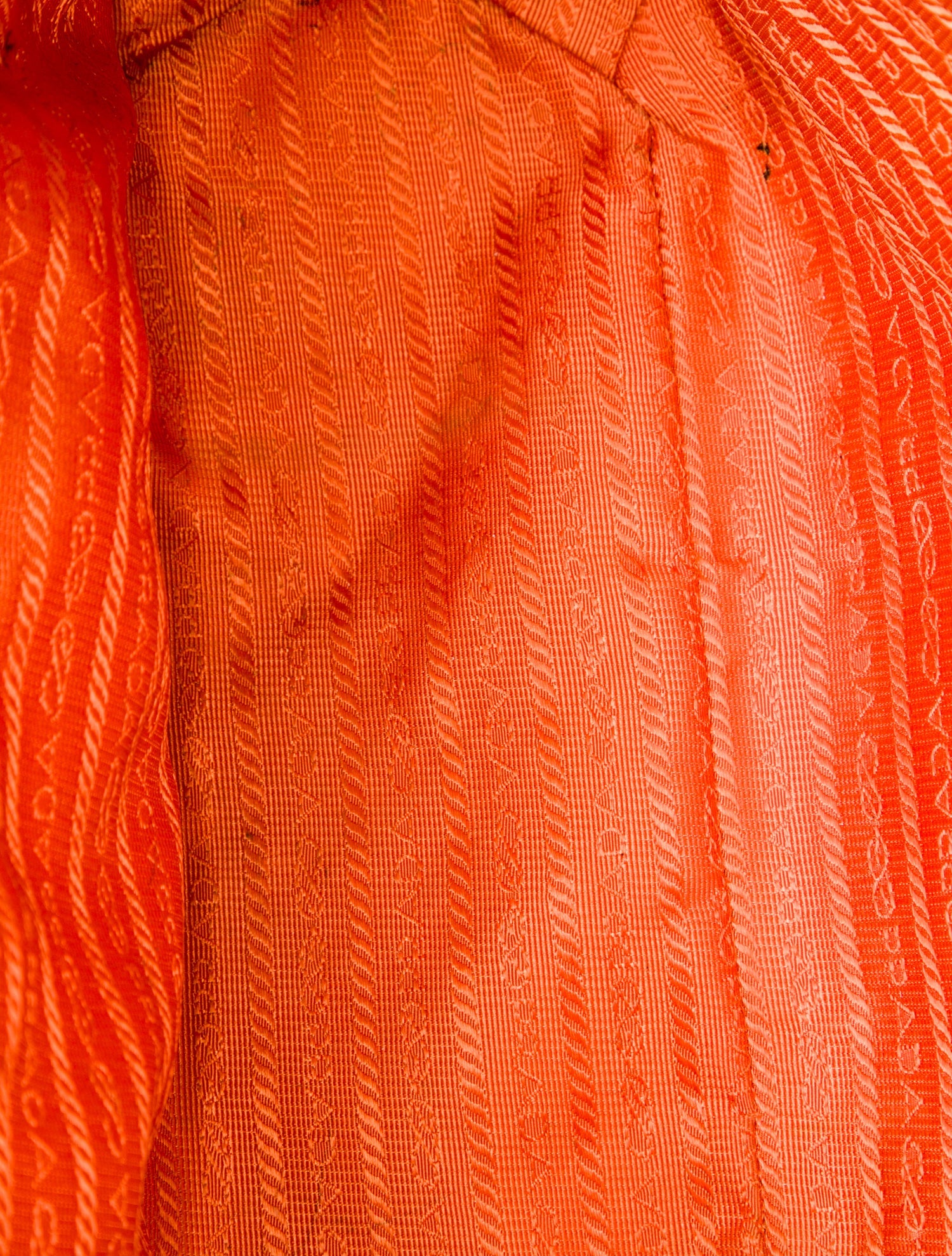 Prada Enameled Metal Triangle Sound